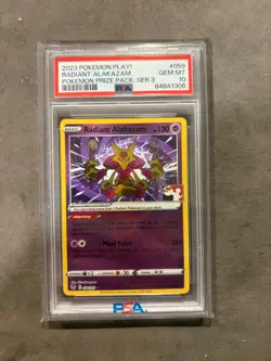 2023 POKEMON PLAY! POKEMON PRIZE PACK: SER 3 #059 RADIANT ALAKAZAM PSA 10 - Image 1