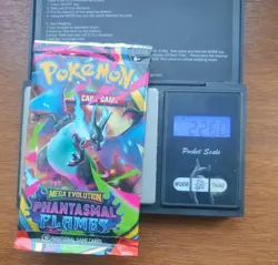 Pokemon Tcg Mega Evolution phantasmal flames Heavy 22.60g Booster Pack Sealed - Image 1