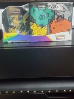 Pokemon Evolving Skies ETB Jolteon, Flareon, Umbreon, Leafeon And Tin 2-Pack - Image 1
