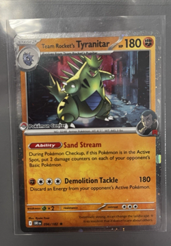 Team Rockets Tyranitar 096/182 Sealed Destined Rivals Pokemon Center Stamp Promo - Image 1