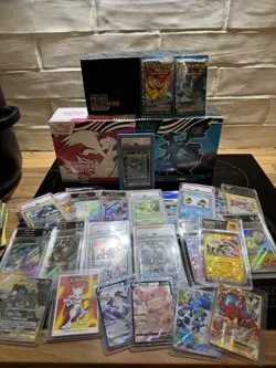 Pokemon TCG huge bundle of etbs packs graded cards raw cards promos and a binder - Image 1