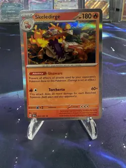 Skeledirge (Surging Sparks 31/191) Cosmos Holo Variant Pokemon TCG card - Image 1