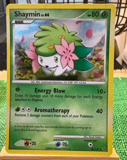 2009 Shaymin 38/127 Platinum Holo Rare Swirl NM Pokemon TCG Card - Image 1