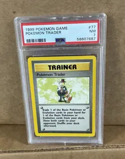 1999 POKEMON BASE SET TRAINER #77 POKEMON TRADER PSA 7 - Image 1