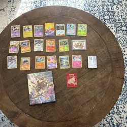 Mixed Pokemon cards + Binder with extra cards + red card sleeve. - Image 1