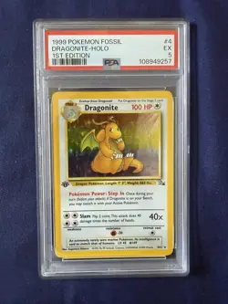 1999 Pokemon Fossil Dragonite Holo 1st Edition #4, PSA 5 - Image 1