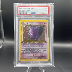 1999 POKEMON FOSSIL 1ST ED #5 GENGAR-HOLO PSA 7 - Image 1