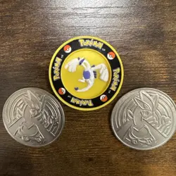 2001 Pokemon TCG Lugia Collectible Coin & Pokemon The Movie 2000 Lugia Coin - Image 1