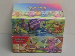 2025 Pokemon Prismatic Evolutions Factory Sealed Mini Tin Display Box - Image 1