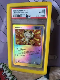 2004 POKEMON EX TEAM MAGMA VS TEAM AQUA #42 MEOWTH-REVERSE FOIL PSA 8 Pop 23 - Image 1