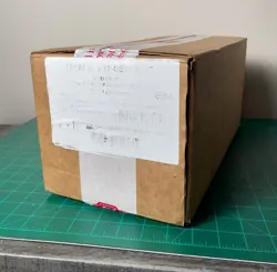 Surging Sparks Pokemon Center ETB Case Sealed (4 ETBs) - Image 1