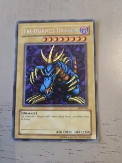 Tri-Horned Dragon LOB-000 The Legend of Blue Eyes White Dragon NM - Image 1