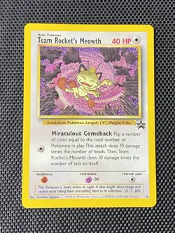 Team Rocket's Meowth Black Star Promo Pokemon Card #18 NM - Image 1