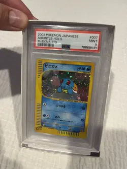 Japanese Squirtle PSA 9 with Squirtle looking at SWIRL Pokemon Card - Image 4