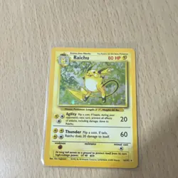 The Pokemon Company Raichu 14/102 Base Set Holo Rare English Pokemon Card - Image 1