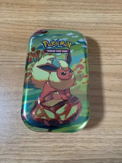 Pokemon TCG Prismatic Evolutions Mini Tin - Flareon Art - Sealed NEW - Image 1