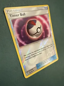 Pokemon Timer Ball Trainer Trading Card 134/149 Reverse Holo Sun and Moon 2017 - Image 2
