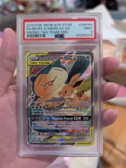 Eevee & Snorlax GX SM169 PSA 9 Tag Team Tins Pokemon Card - Image 1