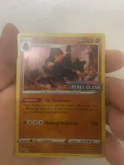 Coalossal SWSH024 Stamped Sword & Shield Rebel Clash Black Star Promo Holo Card - Image 1