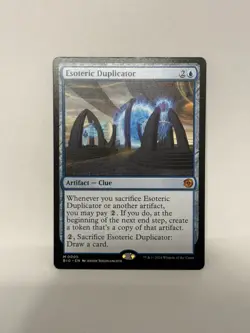 MTG Esoteric Duplicator Normal NM Outlaws of Thunder Junction: The Big Score Mag - Image 1