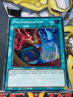 CARTE Yu Gi Oh POLYMERISATION RA03-FR051 NEW ARTWORK 1ere edition SUPER RARE - Image 1