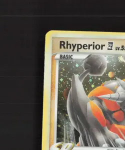 Rhyperior E4 32/111 Rising Rivals Holo Rare Pokemon Card DMG - Image 3