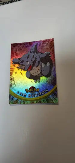 Pokemon Topps Foil Series 2 #112 Rhydon Rainbow Foil Blue Logo TV Animation - Image 1