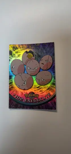 2000 Topps Pokemon TV #102 Exeggcute Rainbow Foil - Image 1