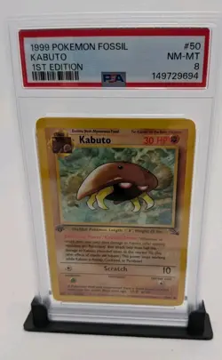 1999 POKEMON FOSSIL 1ST EDITION #50 KABUTO PSA 8 - Image 1