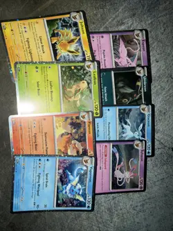 Pokemon Prismatic Evolutions Eeveelution Cosmo Holo Costco Promo NM Full Set - Image 1