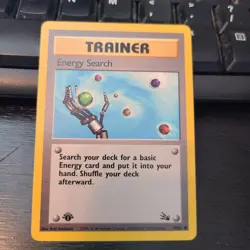 Energy Search 1st Edition 59/62 Fossil Common Pokemon Vintage Card WOTC NM 1999 - Image 1