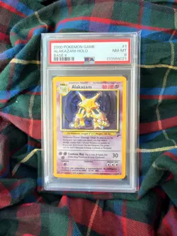 2000 Pokemon Base Set 2 Alakazam Holo Rare PSA 8 #1/130 English TCG WOTC - Image 1