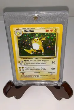 Preowned Pokemon TCG Vintage Raichu Holo Base Set 14/102 - Image 1