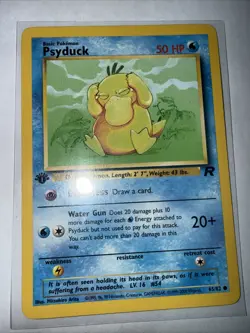 Psyduck 65/82 1st Edition Team Rocket Pokemon Card Near Mint WOTC Vintage TCG - Image 1