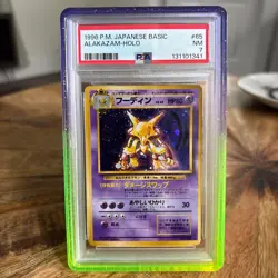 1996 Pokemon Base Set Japanese Alakazam Holo Card #65 PSA 7 - Image 1