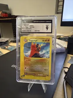 Pokemon CGC 9 MAGCARGO REVERSE HOLO 18/144 VINTAGE SKYRIDGE POKEMON CARD SLAB - Image 1