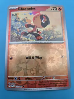 Charcadet 032/191 Sv08: Surging Sparks Reverse Holo Pokemon NM - Image 1