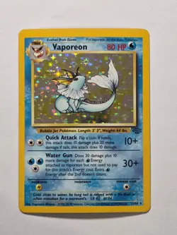Vaporeon 12/64 Jungle Set Rare Holo Pokemon Card WOTC 1999 - Excellent - Image 1