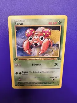 PARAS #59/64 JUNGLE 1ST EDITION 1999 POKEMON TCG - Image 1