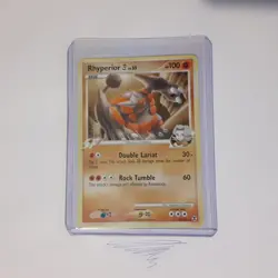 Rhyperior E4 32/111 - 2009 Rare Rising Rivals NM-LP Pokemon Card - Image 1