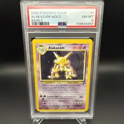 Pokemon TCG PSA 8 Alakazam 001/130 Base Set 2 Holo - Image 1