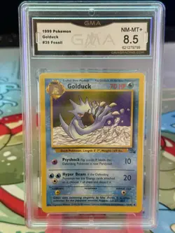 1999 POKEMON FOSSIL #35 GOLDUCK 1ST EDITION GMA 8.5 NM-MT - Image 1
