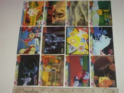 12 Topps 1999 Pokemon trading cards. 1 holograph, 1 Sticker, 2 Puzzle 9 Base Set - Image 1