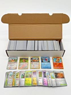 Lot of (800) Pokemon TCG Assorted Holo/Reverse Holo Raw Cards - Image 1