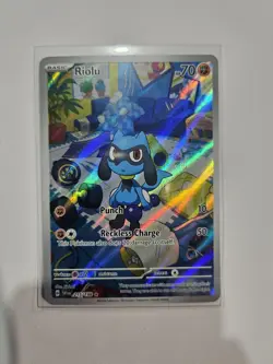 Pokemon TCG Riolu 215/198 Scarlet & Violet Illustration Rare IR Near Mint NM - Image 1