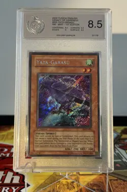 Yugioh Yata-Garasu LOD-000 1st Edition Secret Rare Heavy Foilbleed PSA PGS 8.5 - Image 2
