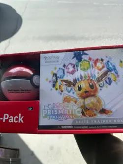 Pokemon Prismatic Evolutions ETB Sealed + Poke Ball Tin Bundle - Image 1