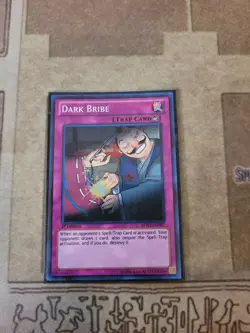 YUGIOH DARK BRIBE BPW2-EN087 SUPER 1ST ED NM - Image 1