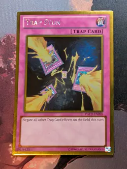 Trap Stun - PGLD-EN090 - Gold Rare, Unlimited - Image 1