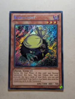 YuGiOh Kuribandit Secret Rare 1st Edition DRLG-EN002 - Image 1
